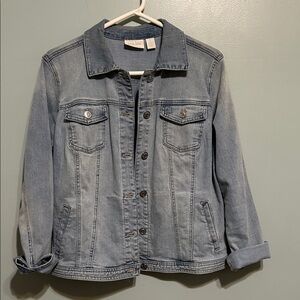 Chico’s Denim Jacket in Washed Blue with black lace accents on back.